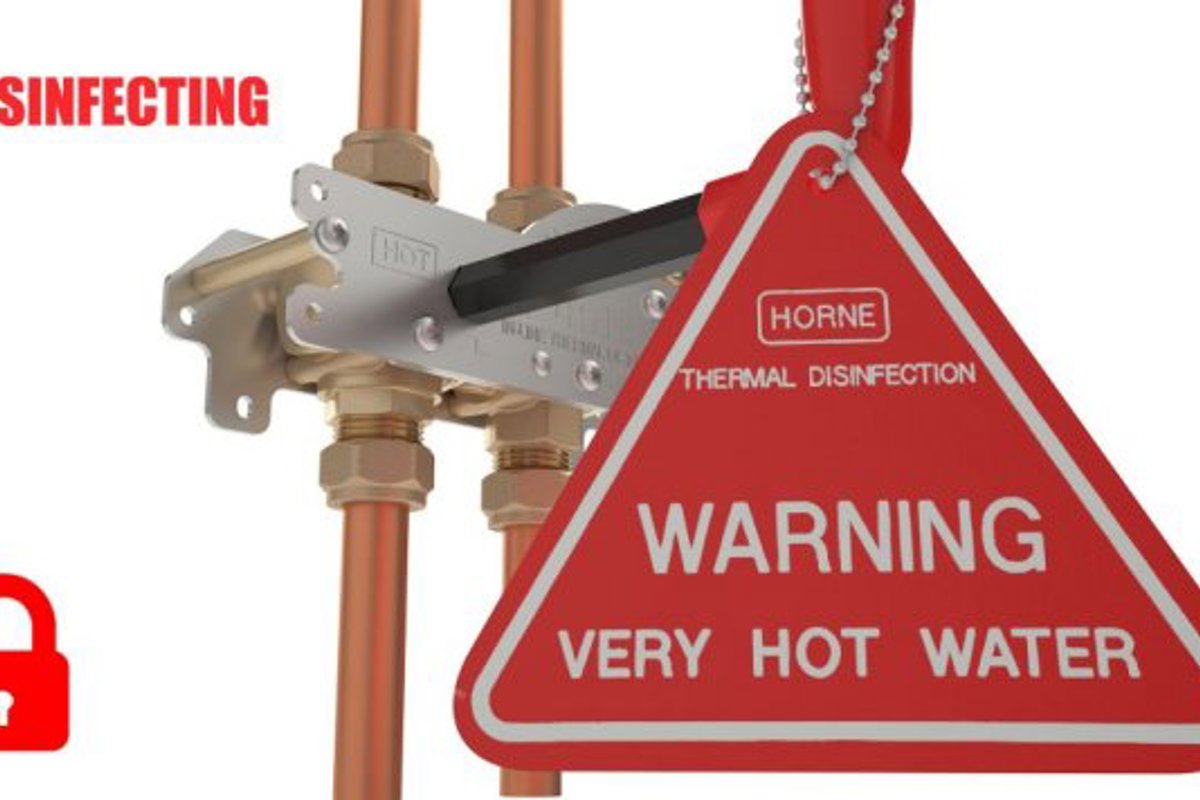 Horne ILTDU operation key with hot water warning sign