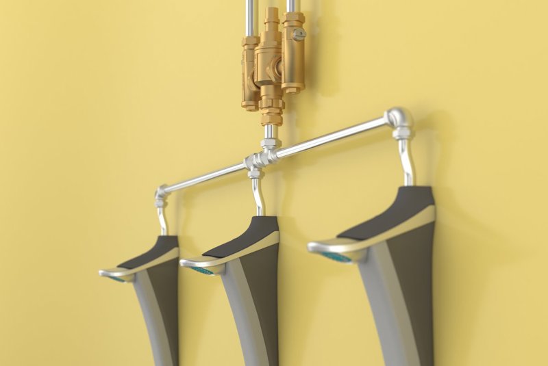 A group installation of Duso shower columns fed with pre-blended warm water from a group TMV (Horne 20 or Horne25)